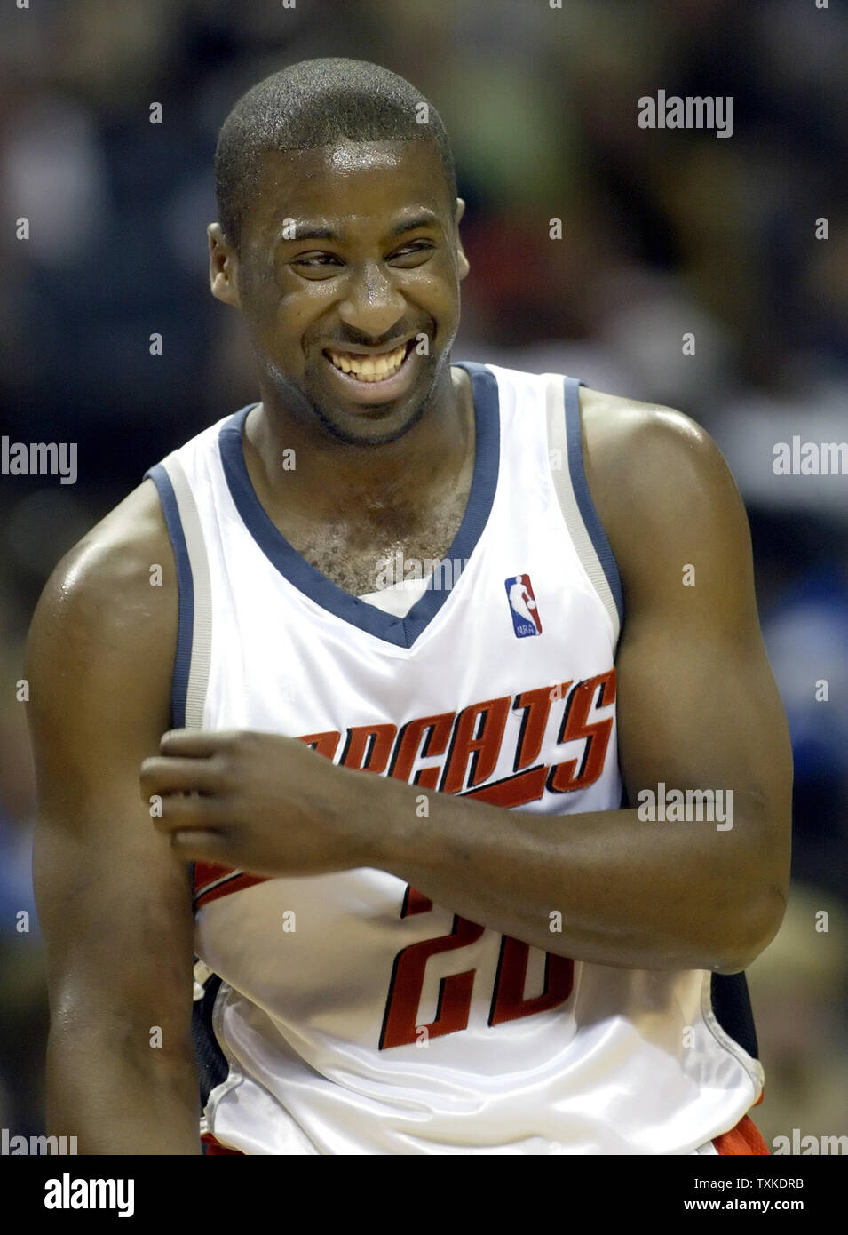 Charlotte Bobcats guard Raymond Felton laughs during a break in the action as Charlotte plays the Miami Heat in the second half at the Charlotte Bobcats Arena in Charlotte, N.C. on April 10, 2007. Charlotte won 92-82. (UPI Photo/Nell Redmond) Stock Photo