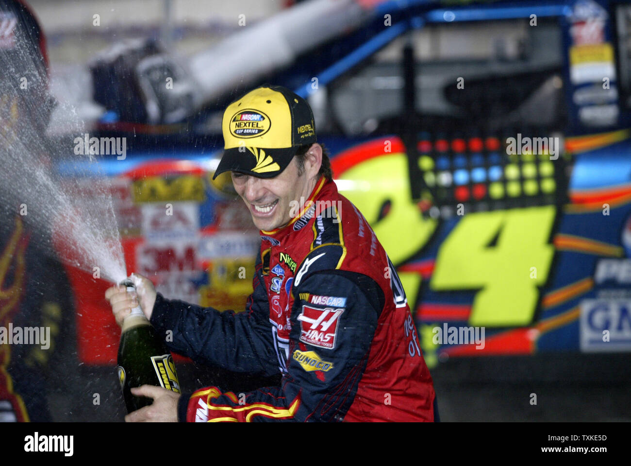 Jeff Gordon celebrates by spraying champagne  in victory lane after winning the Bank of America 500 at Lowe's Motor Speedway near Charlotte, North Carolina on October 13, 2007. (UPI Photo/Nell Redmond) Stock Photo
