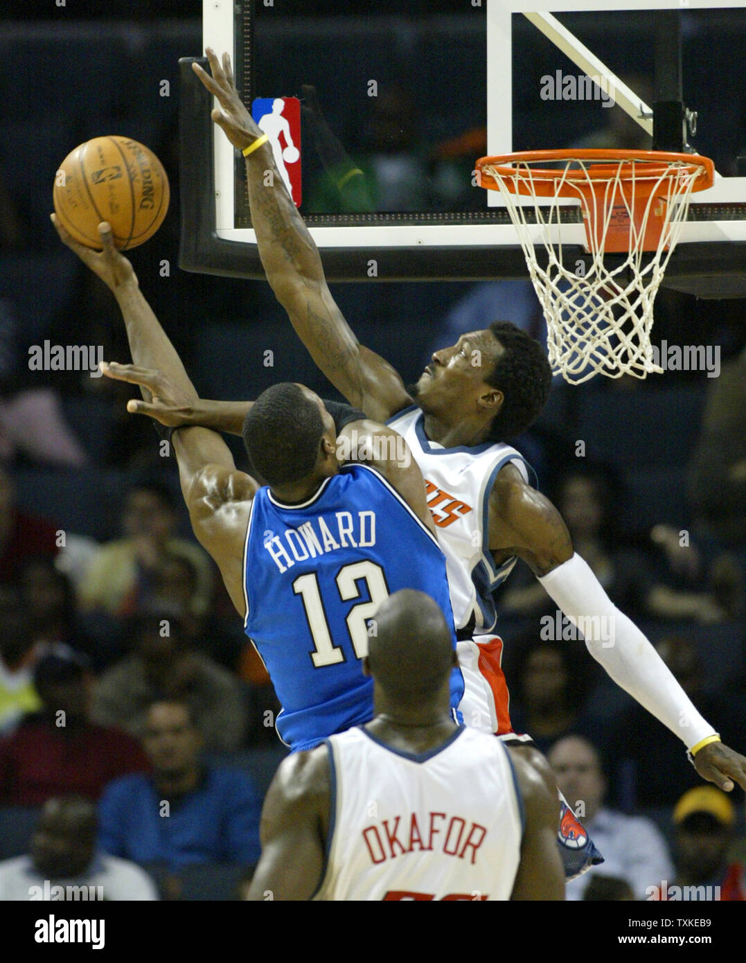 Charlotte Bobcats center Al Jefferson, right, shoots over Indiana Pacers  center Roy Hibbert during the first half of an NBA basketball game in  Charlotte, N.C., Wednesday, March 5, 2014. (AP Photo/Nell Redmond