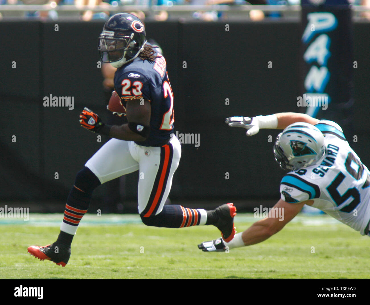 Chicago Bears wide receiver Devin Hester (23) is run into and tackled by  teammate guard Edwin Williams (70) during first half NFL action between the  New York Giants and Chicago Bears at