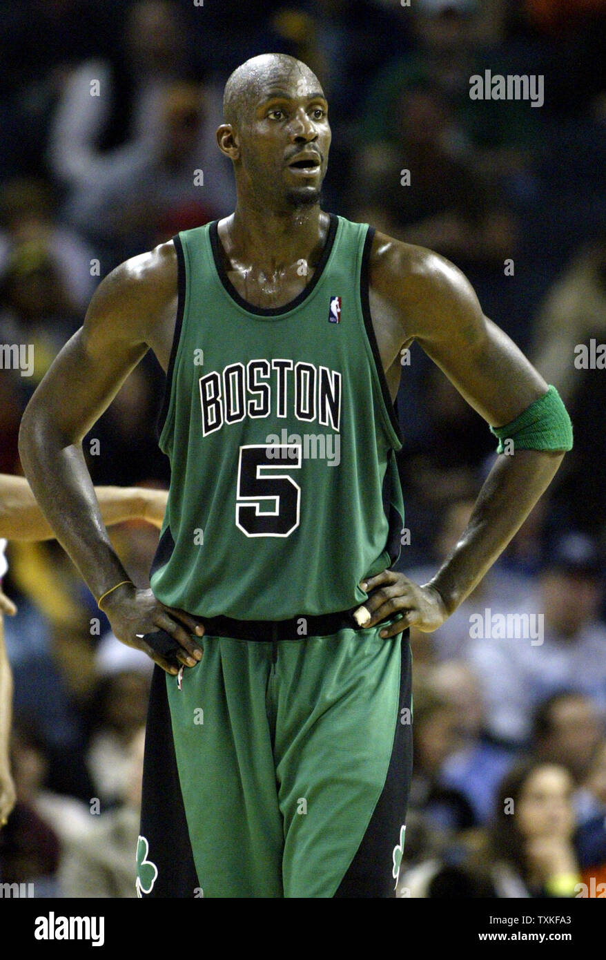 Boston Celtics forward Kevin Garnett walks off the court at the end of regulation as the game against the Charlotte Bobcats goes into overtime in an NBA basketball game in Charlotte, North Carolina on January 6, 2009. Charlotte won 114-106. (UPI Photo/Nell Redmond) Stock Photo