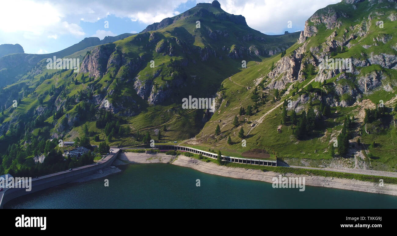 Lago Fedaia (Fedaia lake), an artificial lake and a dam near Canazei, located at the foot of Marmolada massif, as seen from Viel del Pan refuge, Dolom Stock Photo