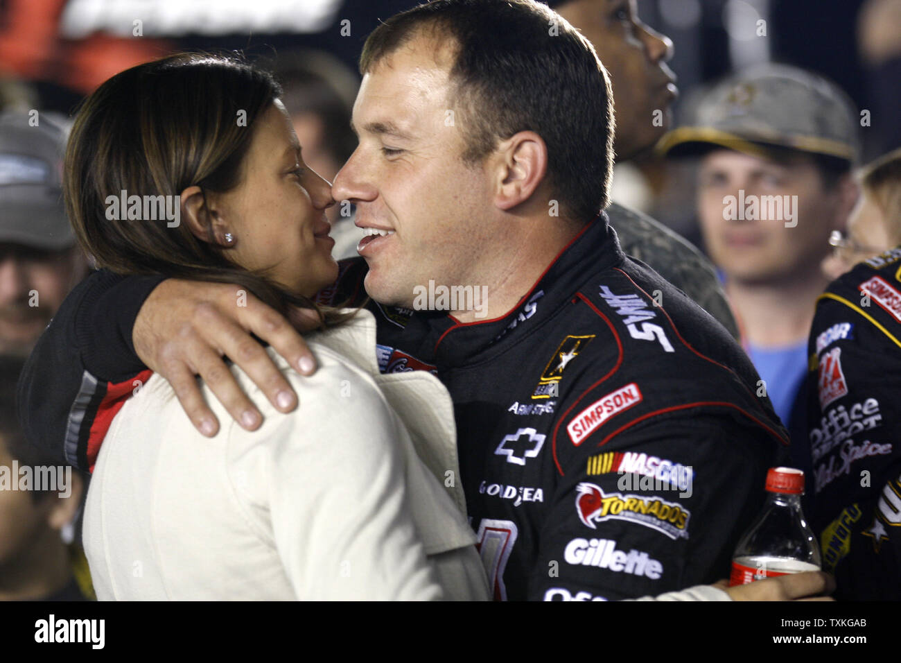Race Car Driver Ryan Newman Right Embraces His Wife Krissie Before The Start Of The Bank Of America 500 Nascar Race In Concord North Carolina On October 16 2010 Upi Nell Redmond Stock