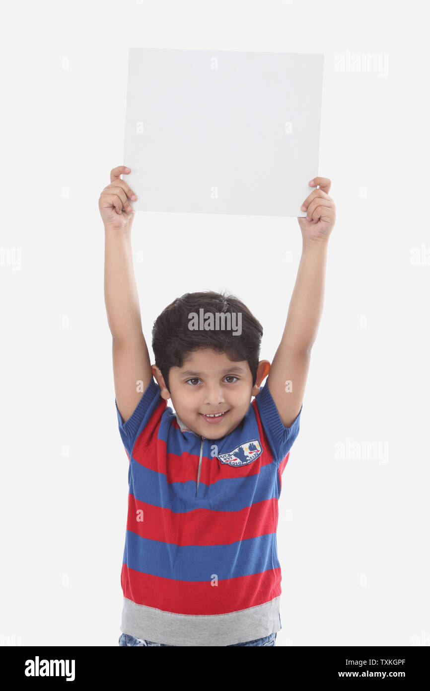 Portrait indian boy holding placard hires stock photography and images