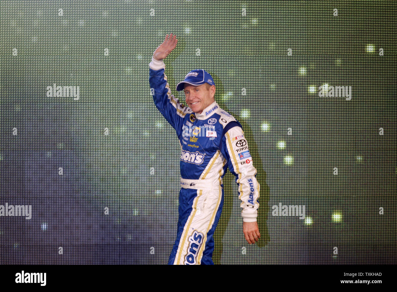 Mark Martin waves to fans during driver introductions at the NASCAR Sprint Cup All-Star Race at the Charlotte Motor Speedway in Concord, North Carolina on May 19, 2012.      UPI/Nell Redmond. Stock Photo