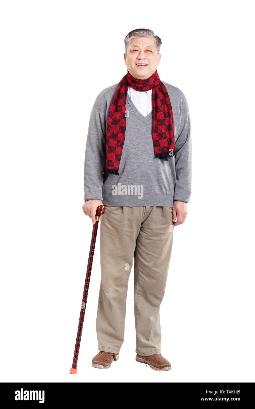 Asian old man in sweater and scarf with cane Stock Photo