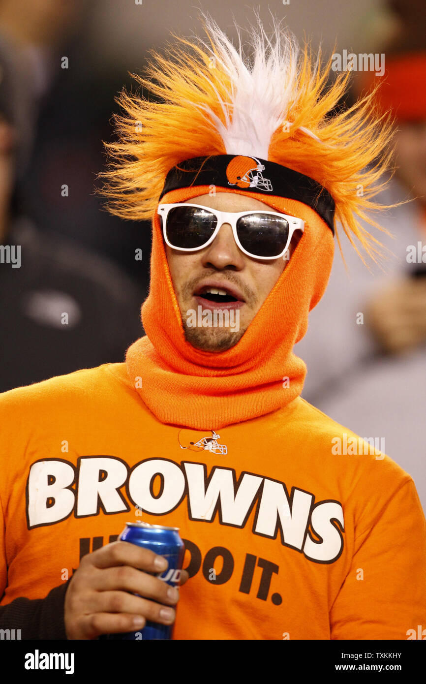 A Cleveland Browns fans cheers for his team during warm-ups before their NFL game against the Cincinnati Bengals at Paul Brown Stadium in Cincinnati, Ohio, November 6, 2014.    UPI /John Sommers II Stock Photo