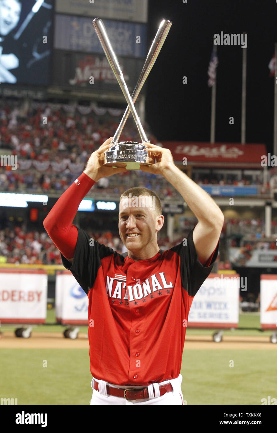 National League's Todd Frazier holds up the Home Run Derby trophy after  defeating Joc Pederson in the Home Run Derby during the 86th All-Star Game  at Great American Ball Park in Cincinnati