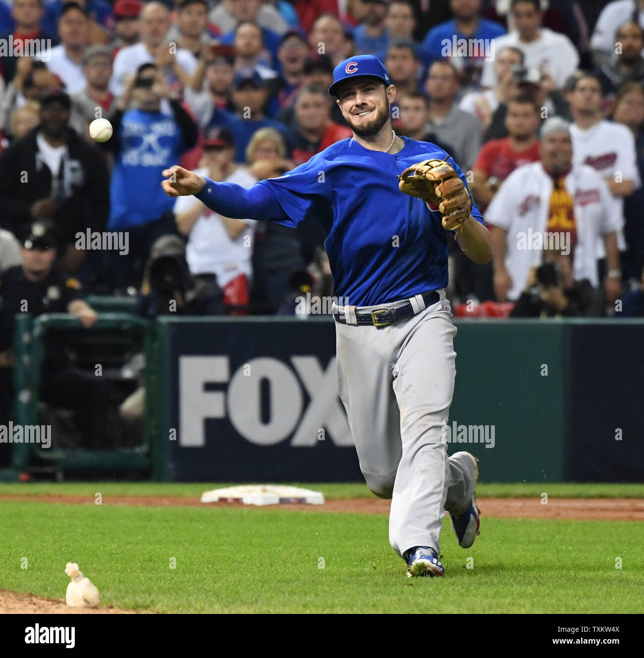 Chicago Cubs Kris Bryant falls throws to first for the final out over the  Cleveland Indians during the tenth inning of World Series game 7 at  Progressive Field in Cleveland, Ohio, on