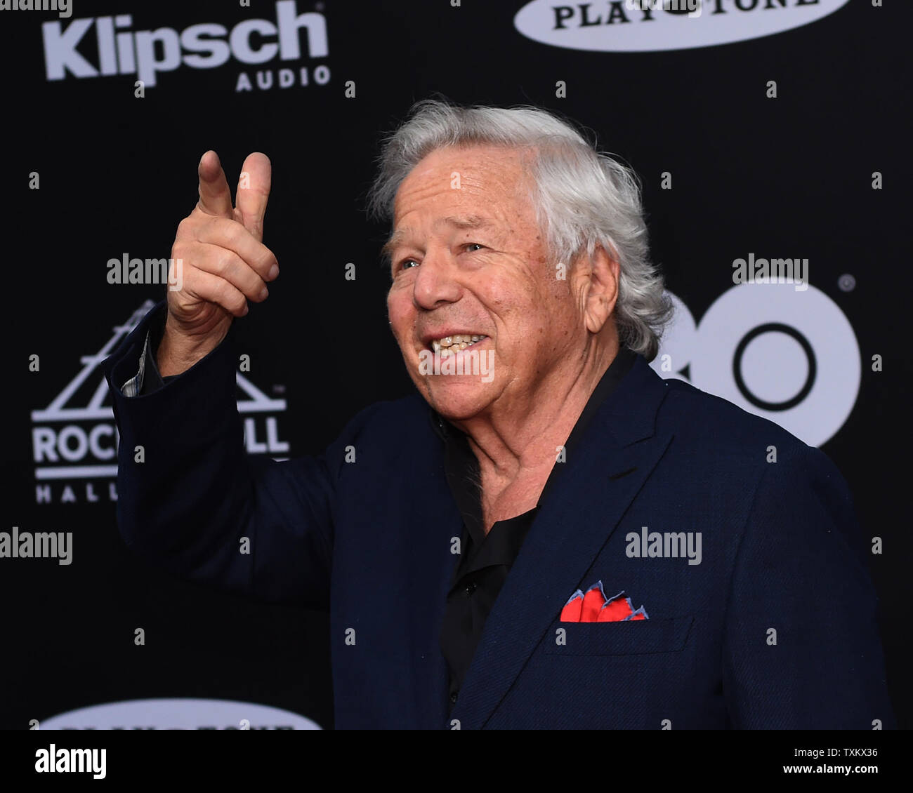 New England Patriots owner Robert Kraft points to fans on the red carpet at the 33rd annual Rock and Roll Hall of Fame induction ceremonies at Public Hall on April 14, 2018 in Cleveland Ohio. Bon Jovi, the Cars and four first-time nominees, including Nina Simone, will be inducted Saturday night as the 2018 Rock & Roll Hall of Fame class. Photo by Scott McKinney/UPI Stock Photo