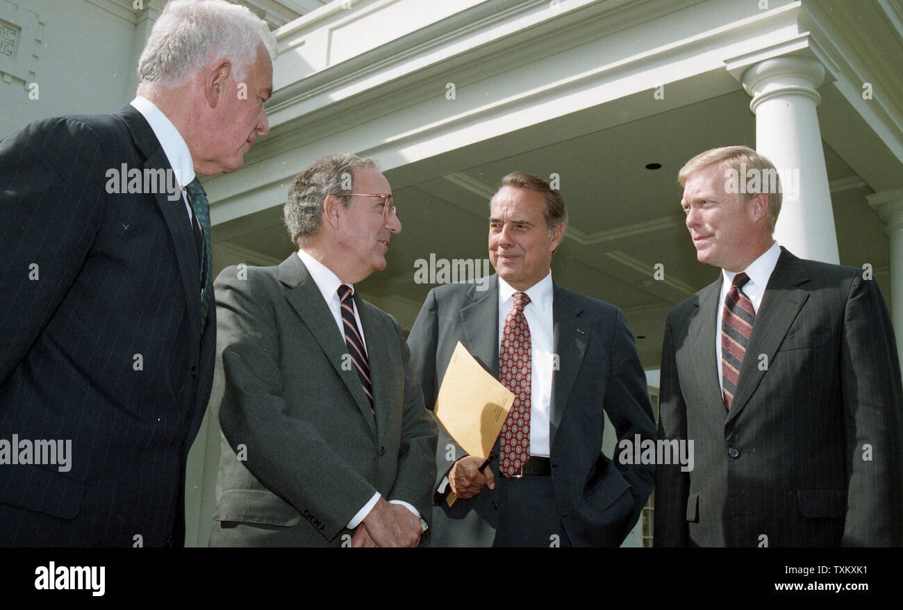 Sen. Bob Dole (R-KS) (2nd R) and Speaker of the House Thomas Foley (R-WA) (L) speak to reporters after meeting with U.S. President Bill Clinton to discuss the situation in Somalia outside the West Wing of the White House in Washington on October 7, 1993. UPI/Cliff Owen Stock Photo