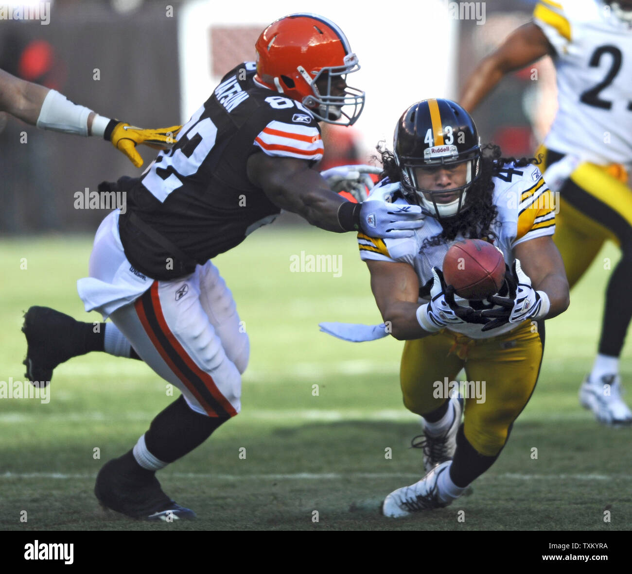 Pittsburgh Steelers safety Troy Polamalu, right, intercepts a pass