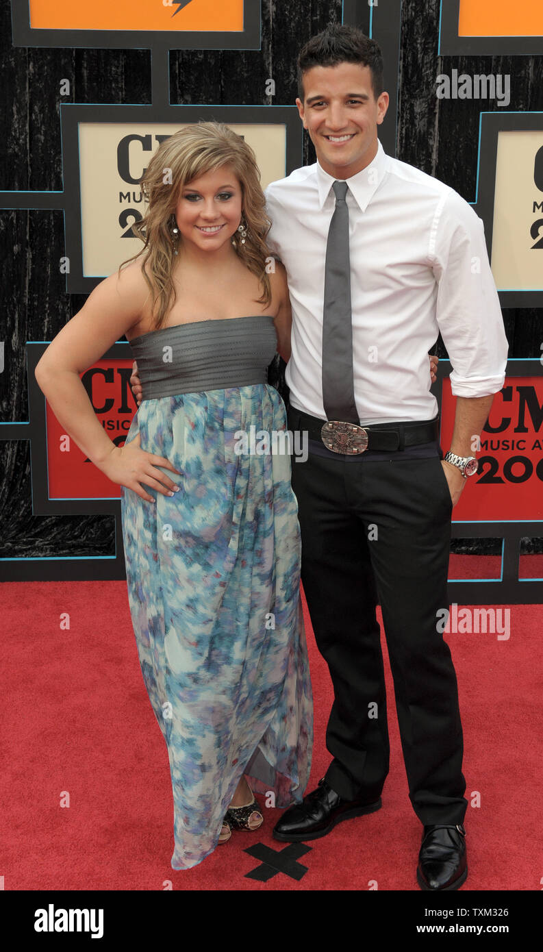 Shawn Johnson (L) and Mark Ballas arrive for the Country Music