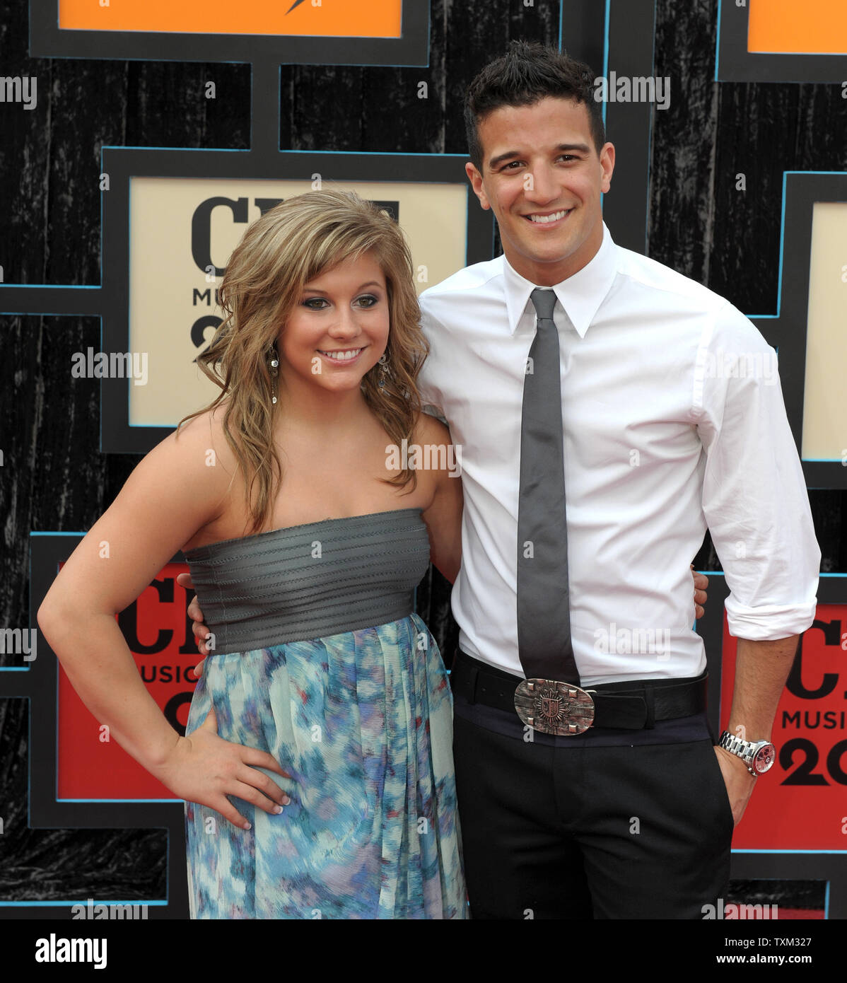 Shawn Johnson (L) and Mark Ballas arrive for the Country Music