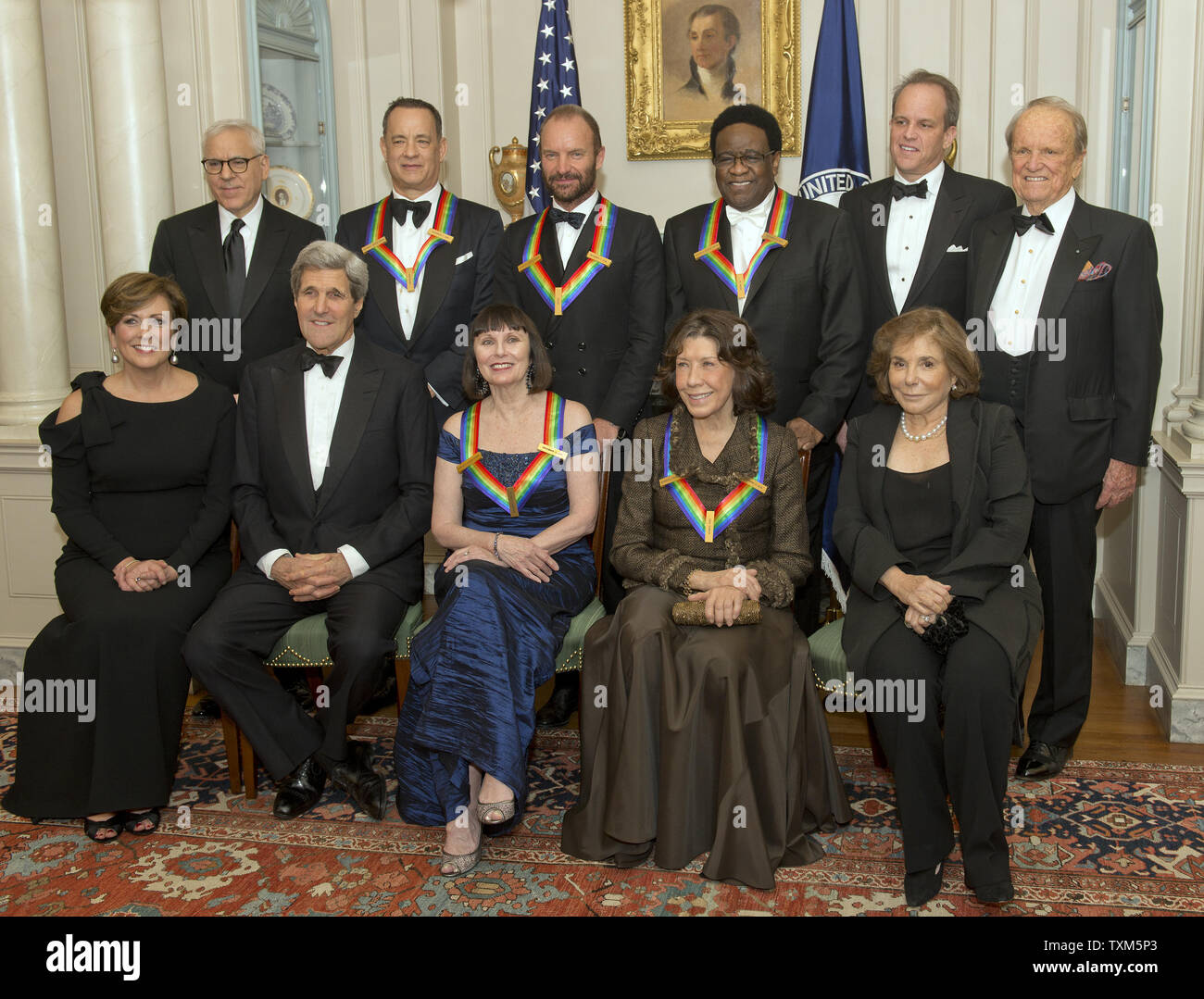 The five recipients of the 2014 Kennedy Center Honors pose for a group photo following a dinner hosted by United States Secretary of State John F. Kerry at the U.S. Department of State in Washington, D.C. on Saturday, December 6, 2014. From left to right top row: David M. Rubenstein, Chairman of the John F. Kennedy Center for the Performing Arts; actor and filmmaker Tom Hanks; singer-songwriter Sting; singer Al Green; Michael Stevens, writer and producer of the annual Kennedy Center Honors; and George Stevens, Jr., producer of the annual Kennedy Center Honors. From left to right, bottom row: Stock Photo