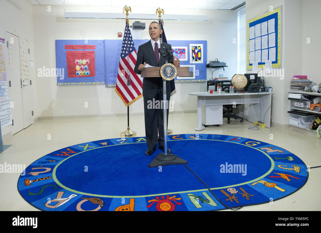 United States President Barack Obama makes remarks on the FY 2015 budget at Powell Elementary School in Washington, D.C. on Tuesday, March 4, 2014. The President also took a question on the situation in the Ukraine. .Credit: Ron Sachs / Pool via CNP Stock Photo