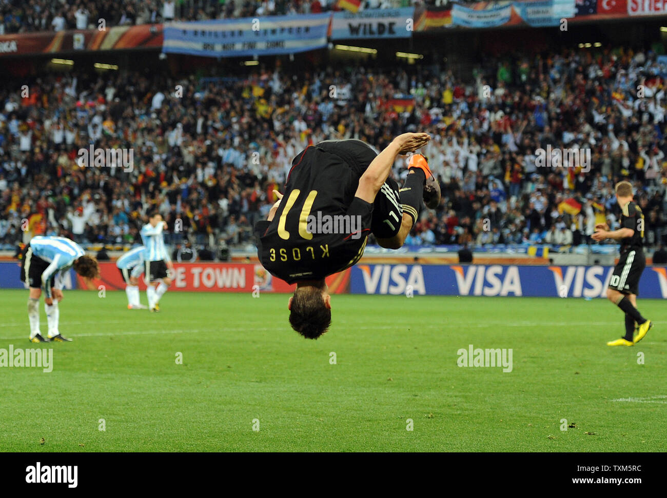 Miroslav Klose of Germany flips as he celebrates scoring his team's fourth goal during the FIFA World Cup Quarter Final match at the Green Point Stadium in Cape Town, South Africa on July 3, 2010. UPI/Chris Brunskill Stock Photo
