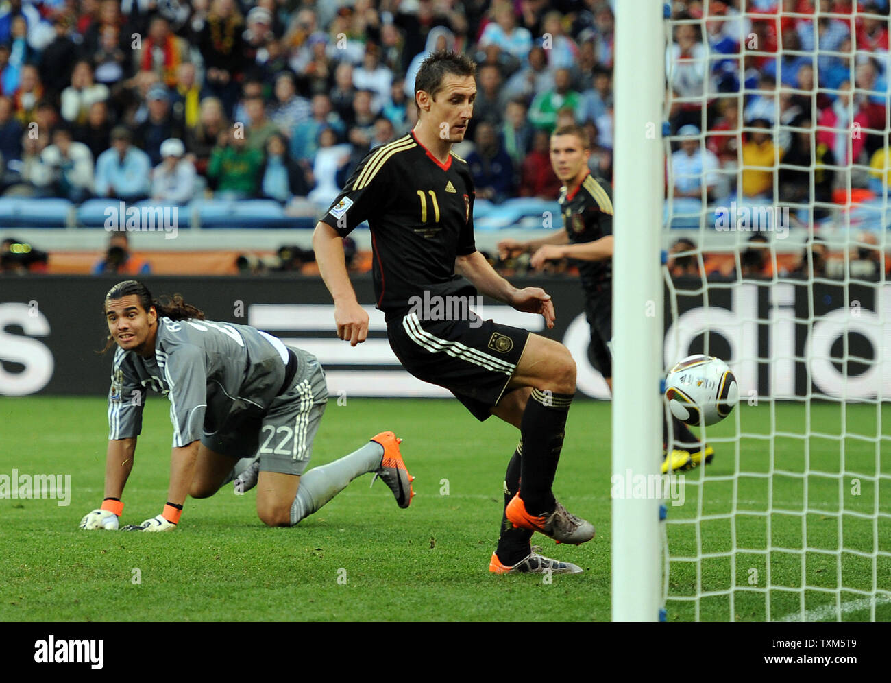 Miroslav Klose of Germany scores his team's second goal during the FIFA World Cup Quarter Final match at the Green Point Stadium in Cape Town, South Africa on July 3, 2010. UPI/Chris Brunskill Stock Photo