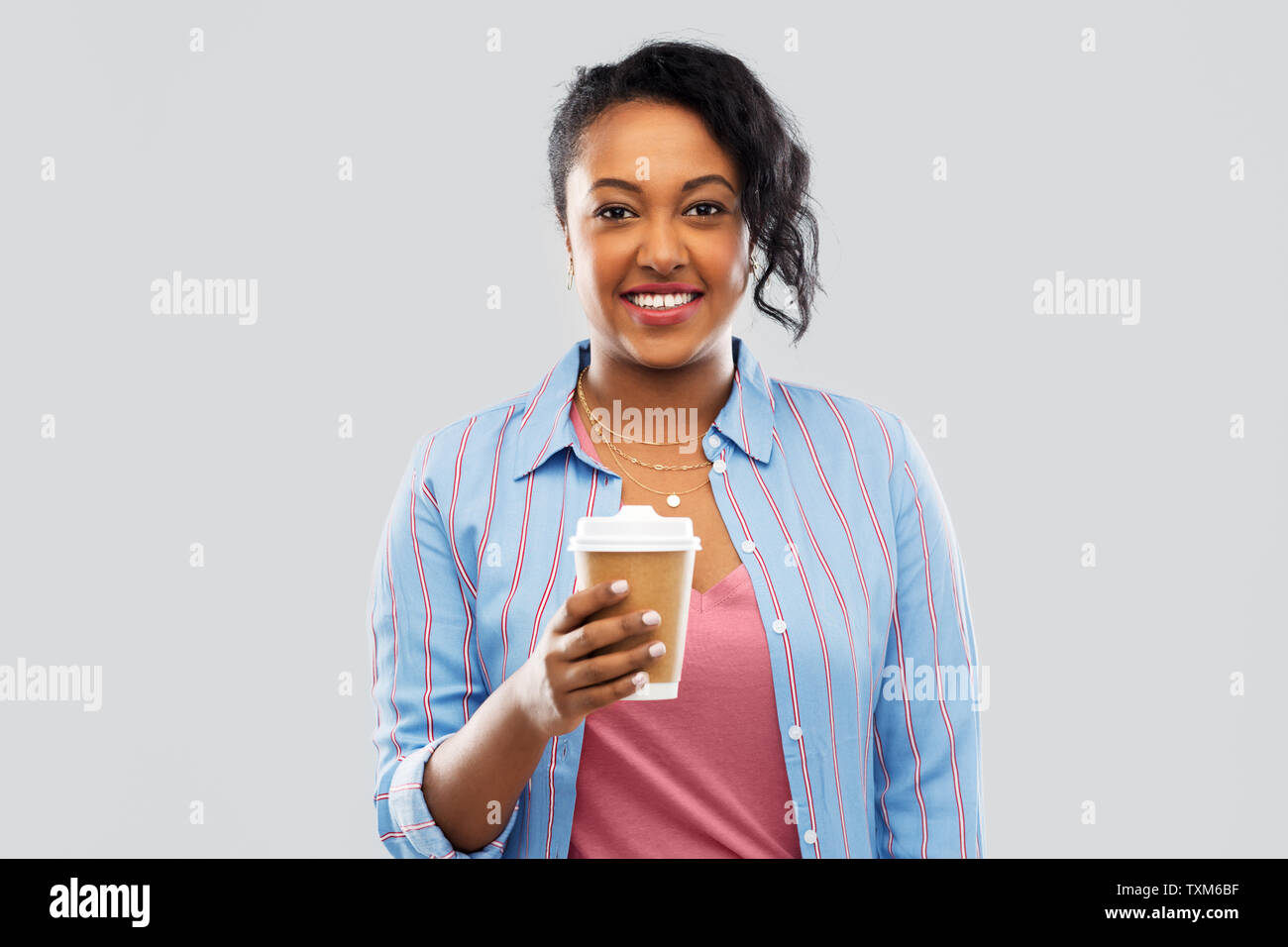 happy african american woman drinking coffee Stock Photo - Alamy