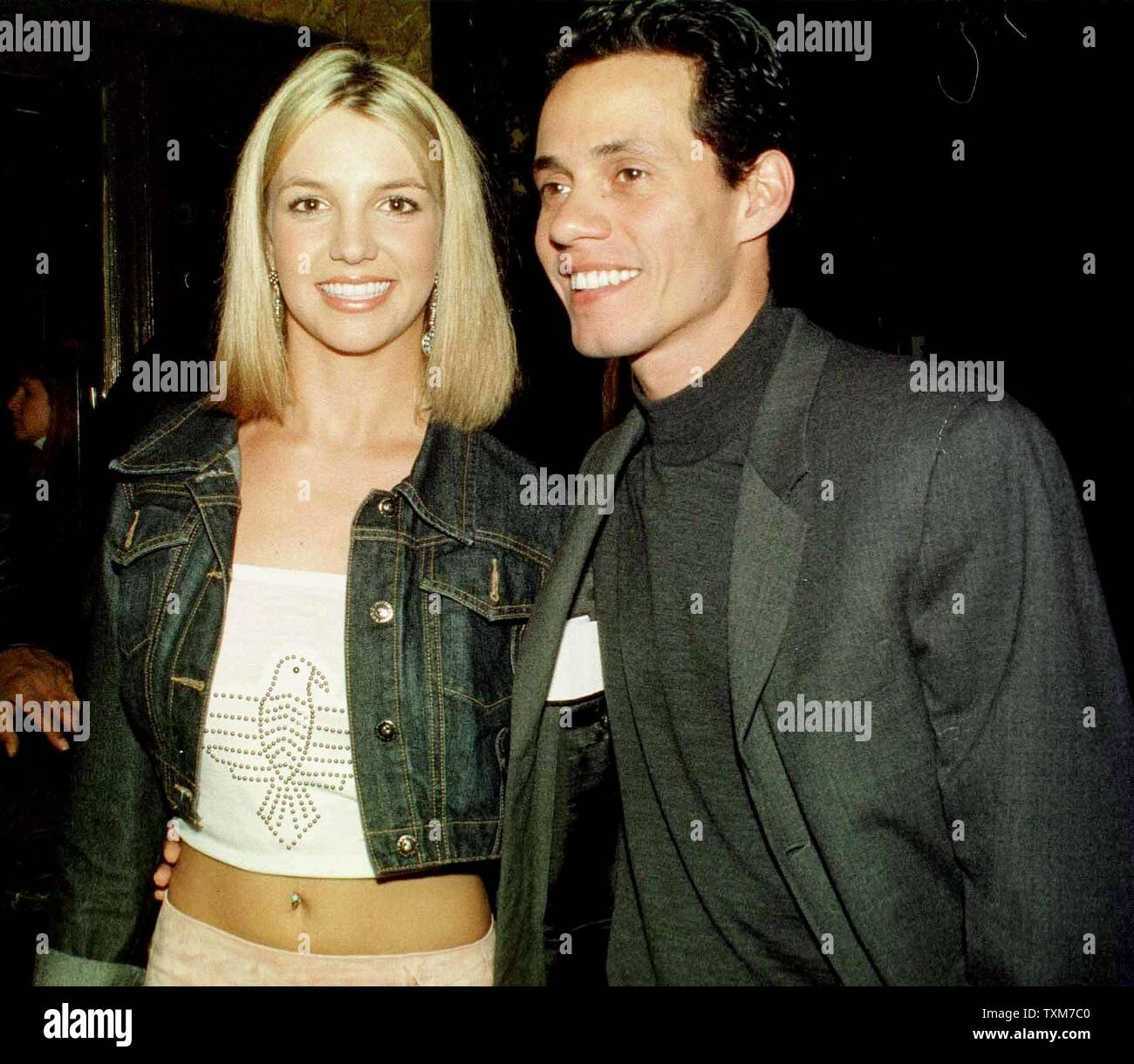 NYP2000010401- 04 JANUARY 2000 - NEW YORK, NEW YORK, USA: Grammy Award nominees Britney Spears (Best New Artist) and Marc Anthony (Best Male Pop Artist) pose, January 4 , after the Grammy Awards announcements in New York.  rg/ep/Ezio Petersen  UPI Stock Photo