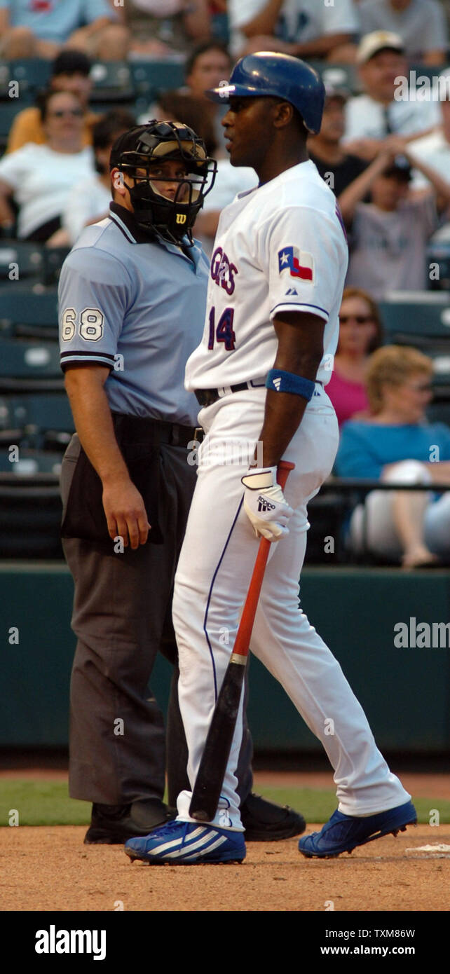 Texas Rangers Gary Matthews has a few words for homeplate umpire Chris Guccione after Matthews was called out on strikes July 26, 2006 at Ameriquest Field in Arlington, Texas.  (UPI Photo/Ian Halperin) Stock Photo