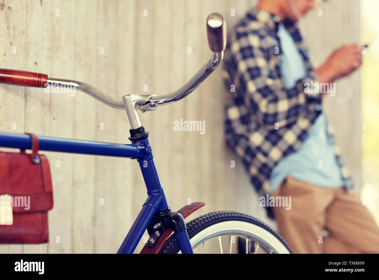 man with fixed gear bicycle on street Stock Photo