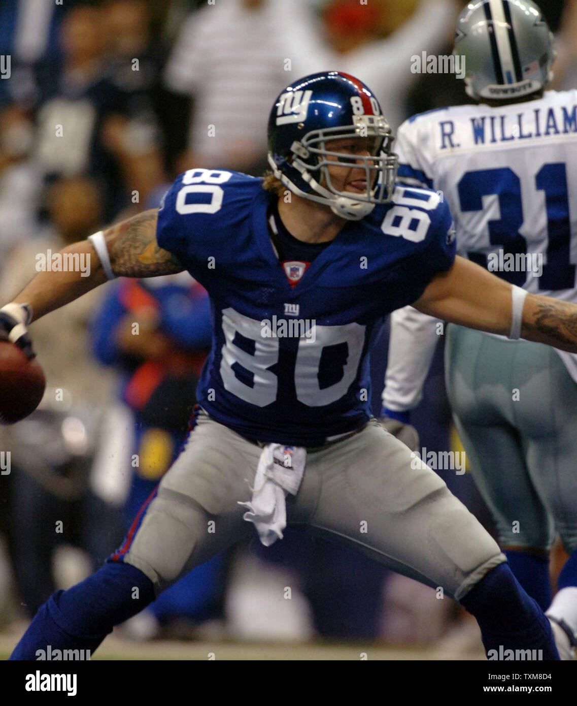 Jeremy Shockey New York Giants Unsigned Red Jersey Running Photograph