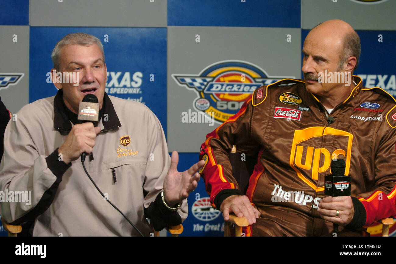 Dr. Phil McGraw and NASCAR driver Dale Jarrett talk to the media about the U.S. Marine Corps Reserves Toys for Tots program prior to the NASCAR Dickies 500 at Texas Motor Speedway in Ft. Worth, TX on November 5, 2006.  The two teamed up with NASCAR to help raise awareness of the program.    (UPI Photo/Ian Halperin) Stock Photo