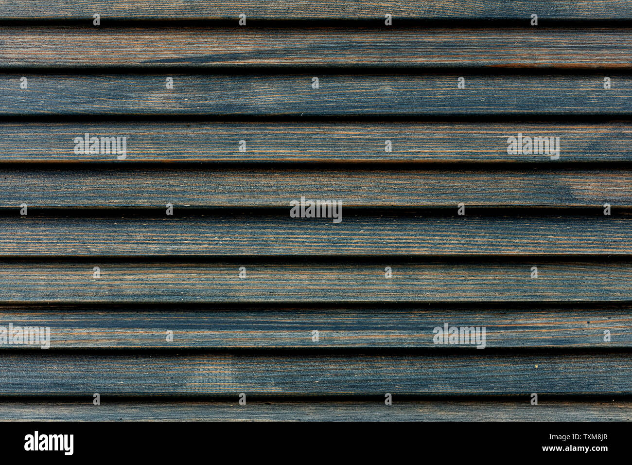 Old worn wooden background of blue and cyan. Blur effect. Stock Photo