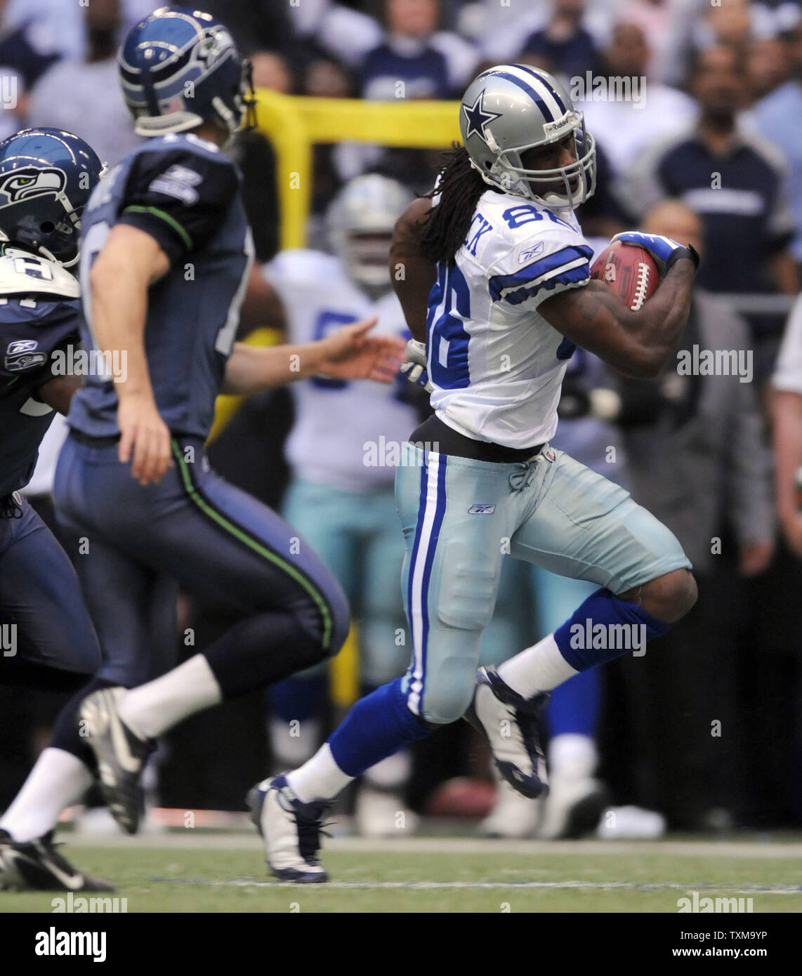 Dallas Cowboys Isaiah Stanback cuts upfield as Seattle Seahawks