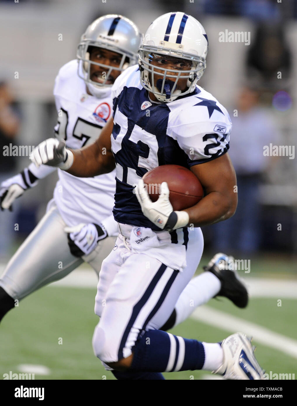 Dallas Cowboys Tashard Choice rushes against the Baltimore Ravens