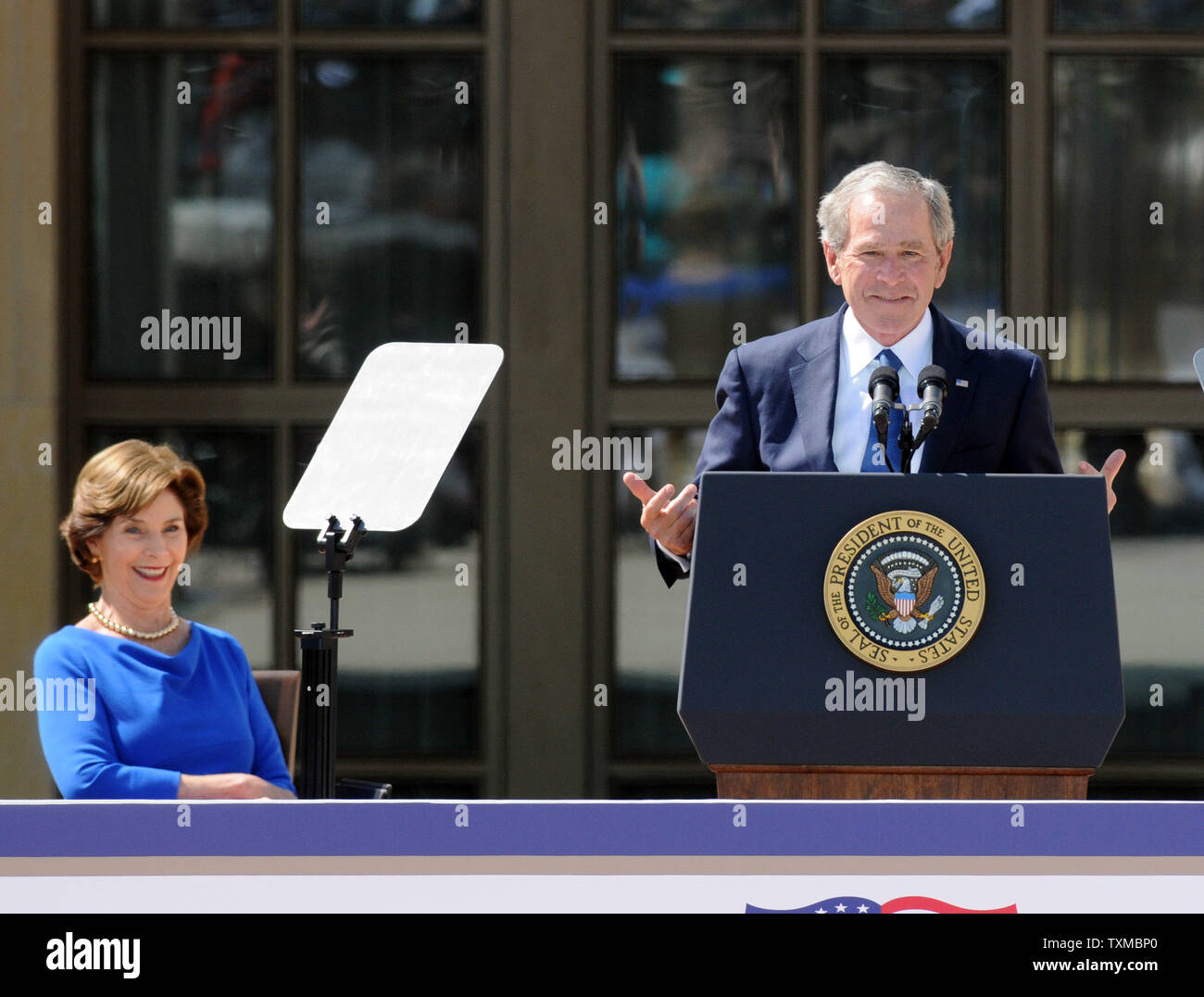 President George W. Bush delivers remarks at the dedication of his Presidential Library in Dallas on April 25, 2013. The museum, located on the campus of SMU in Dallas, features a permanent exhibit that uses artifacts, documents, photographs, and videos from the Library's extensive collection to capture the key decisions and events of the Presidency of George W. Bush.  .UPI/Ian Halperin Stock Photo
