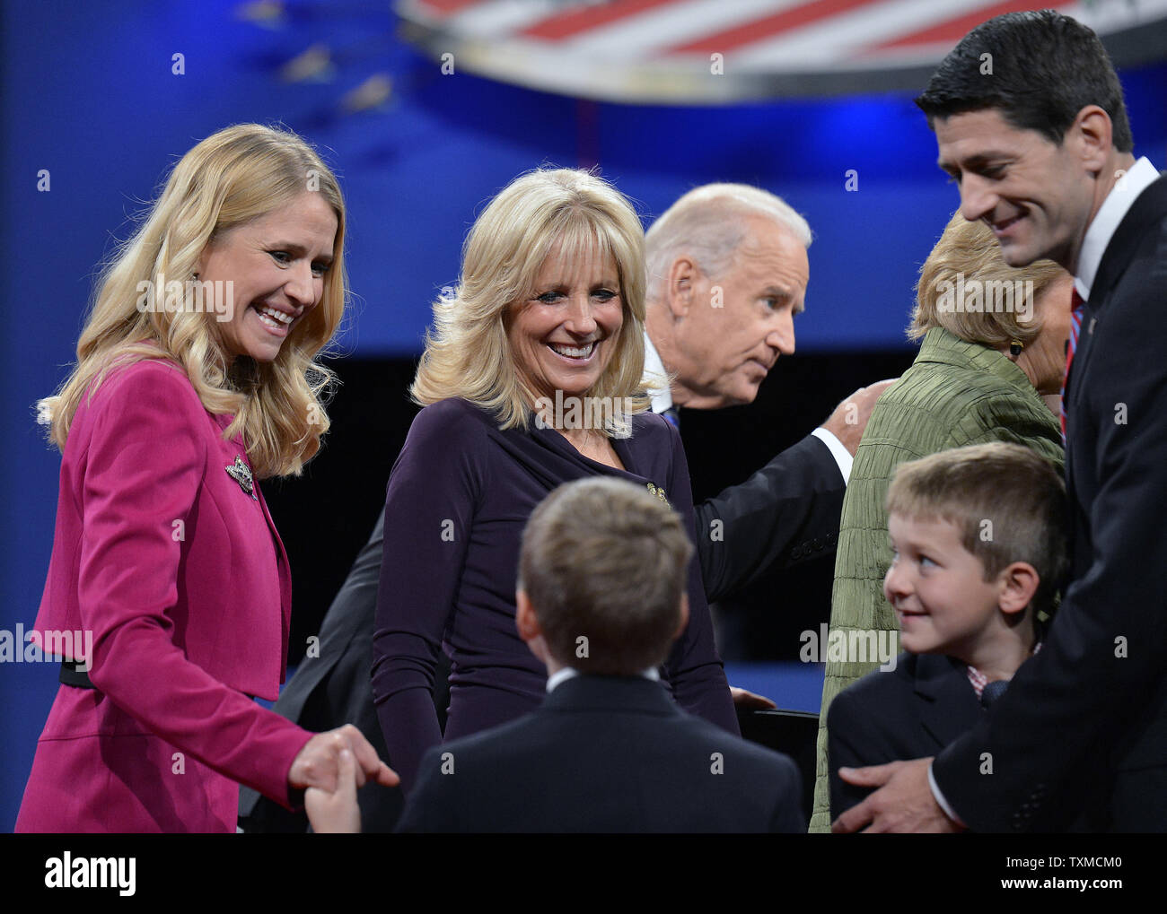 Janna Ryan, wife of Republican vice presidential nominee Rep. Paul Ryan, of  Wisconsin, right, gets a kiss from Vice President Joe Biden following the  vice presidential debate at Centre College, Thursday, Oct. 11, 2012, in  Danville, Ky. (AP Photo/Eric 