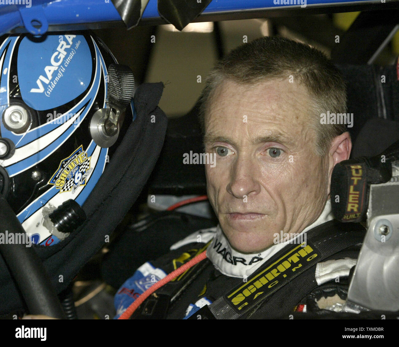 Mark Martin sits in his car prior to the running of the NASCAR Pepsi