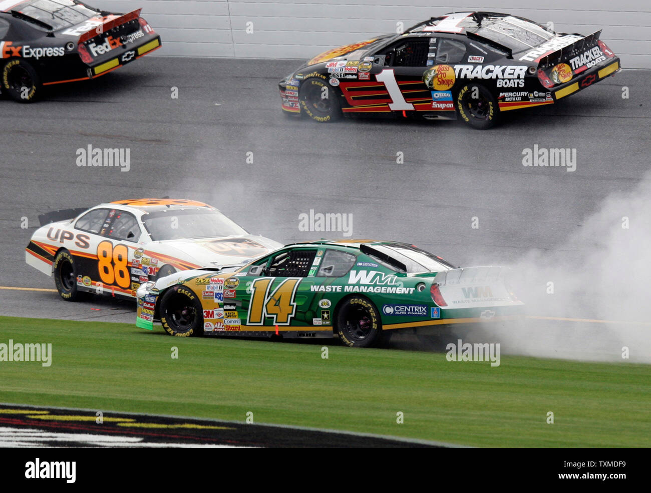 Dale Jarrett in the UPS 88 car is hit by Sterling Marlins Waste Management #14 during the running of the 1st NASCAR Gatorade Duel 150, at Daytona International Speedway in Daytona Beach,  Florida on February 16, 2006.  (UPI Photo/Michael Bush) Stock Photo