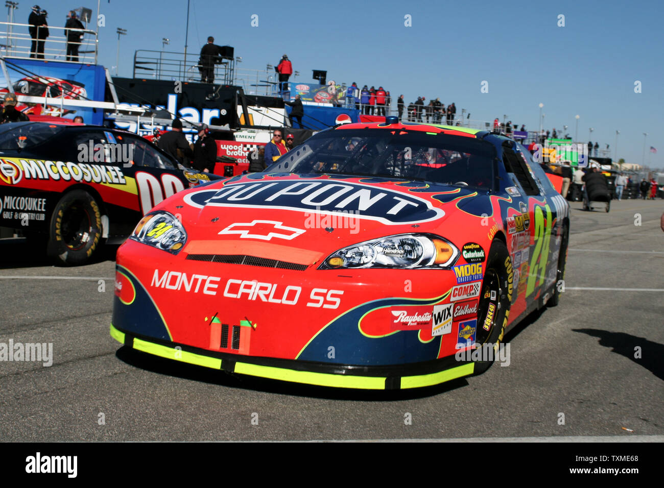 Jeff Gordon Drives Out Of The Garage Area During Happy Hour