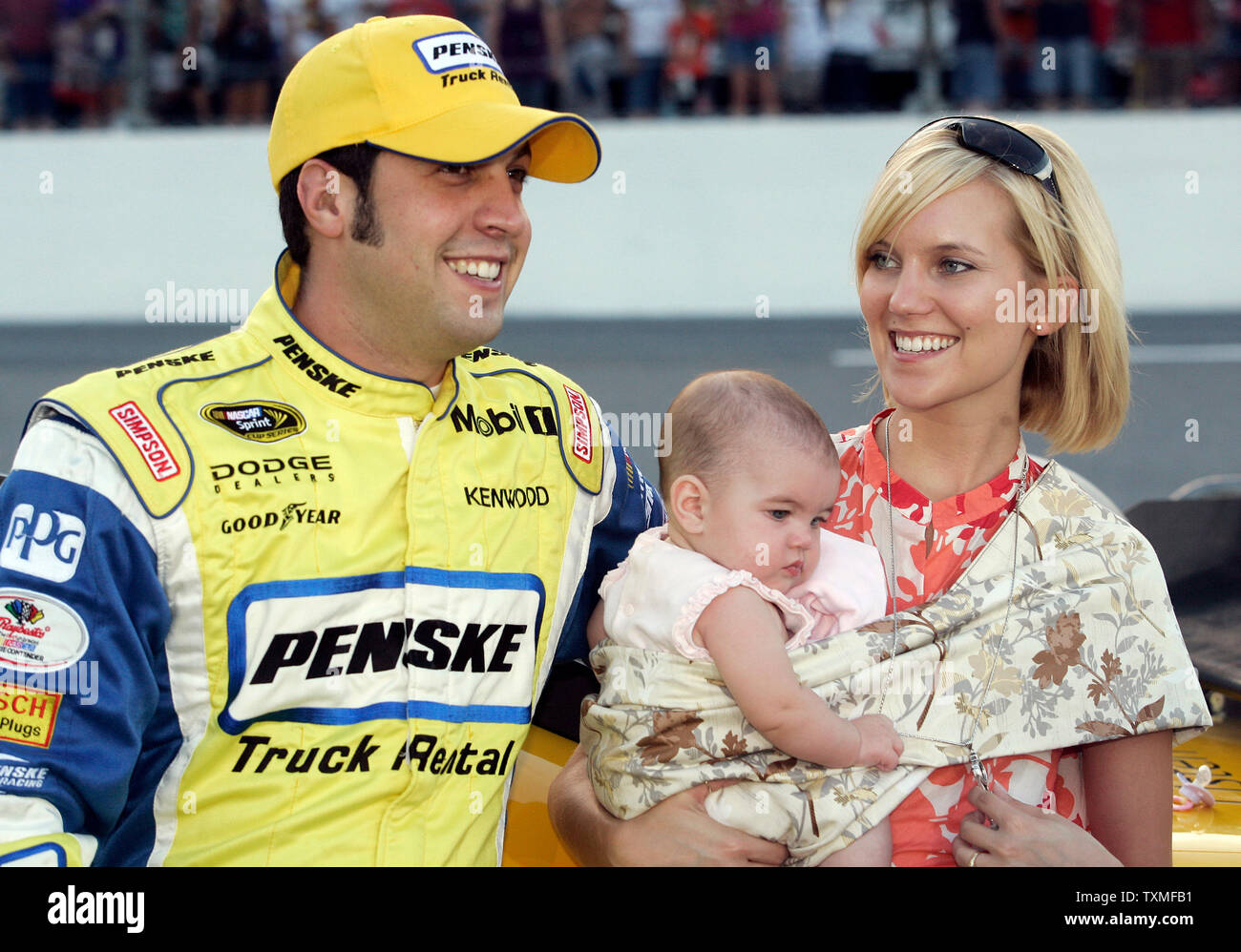 Sam Hornish Jr and his wife Crystal share a moment with their daughter Addison Faith just prior to the NASCAR Sprint Cup Coke Zero 400 at Daytona International Speedway in Daytona Beach, Florida on July 5, 2008. (UPI Photo/Michael Bush) Stock Photo