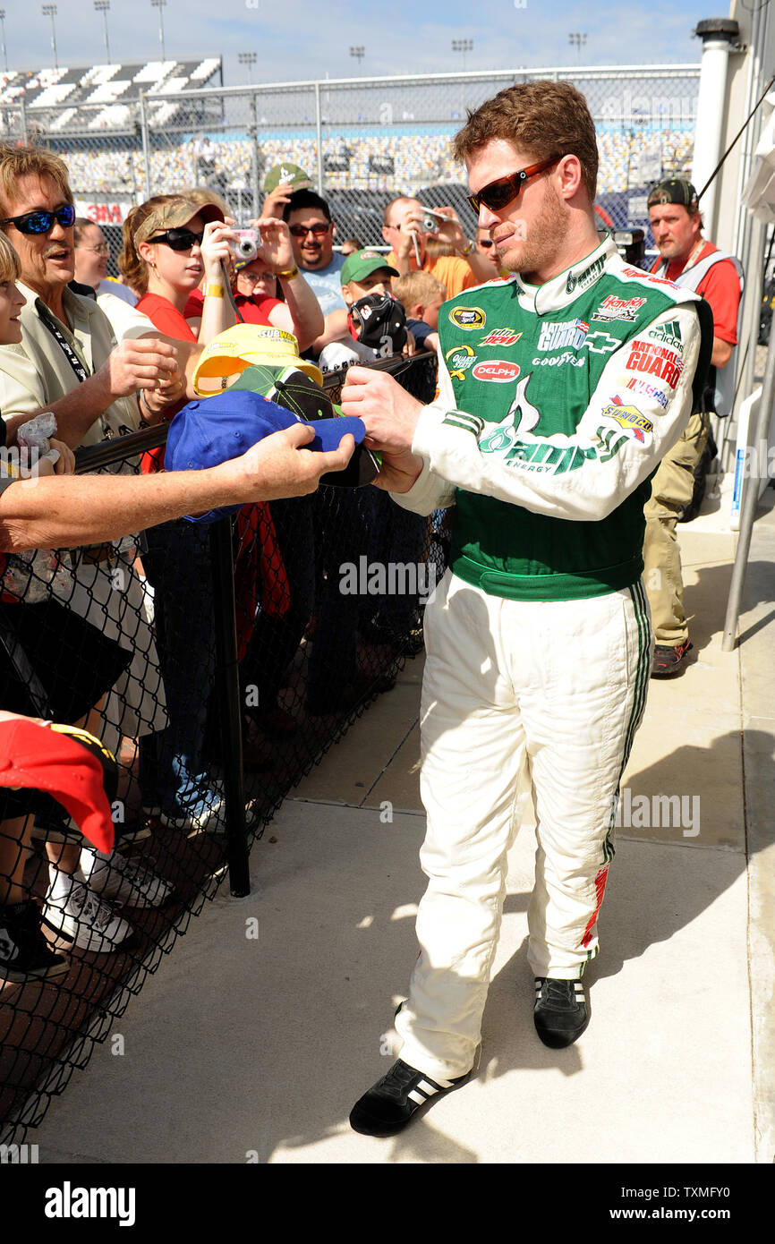 Dale Earnhardt Jr Signs Autographs Just Outside The Garage Area