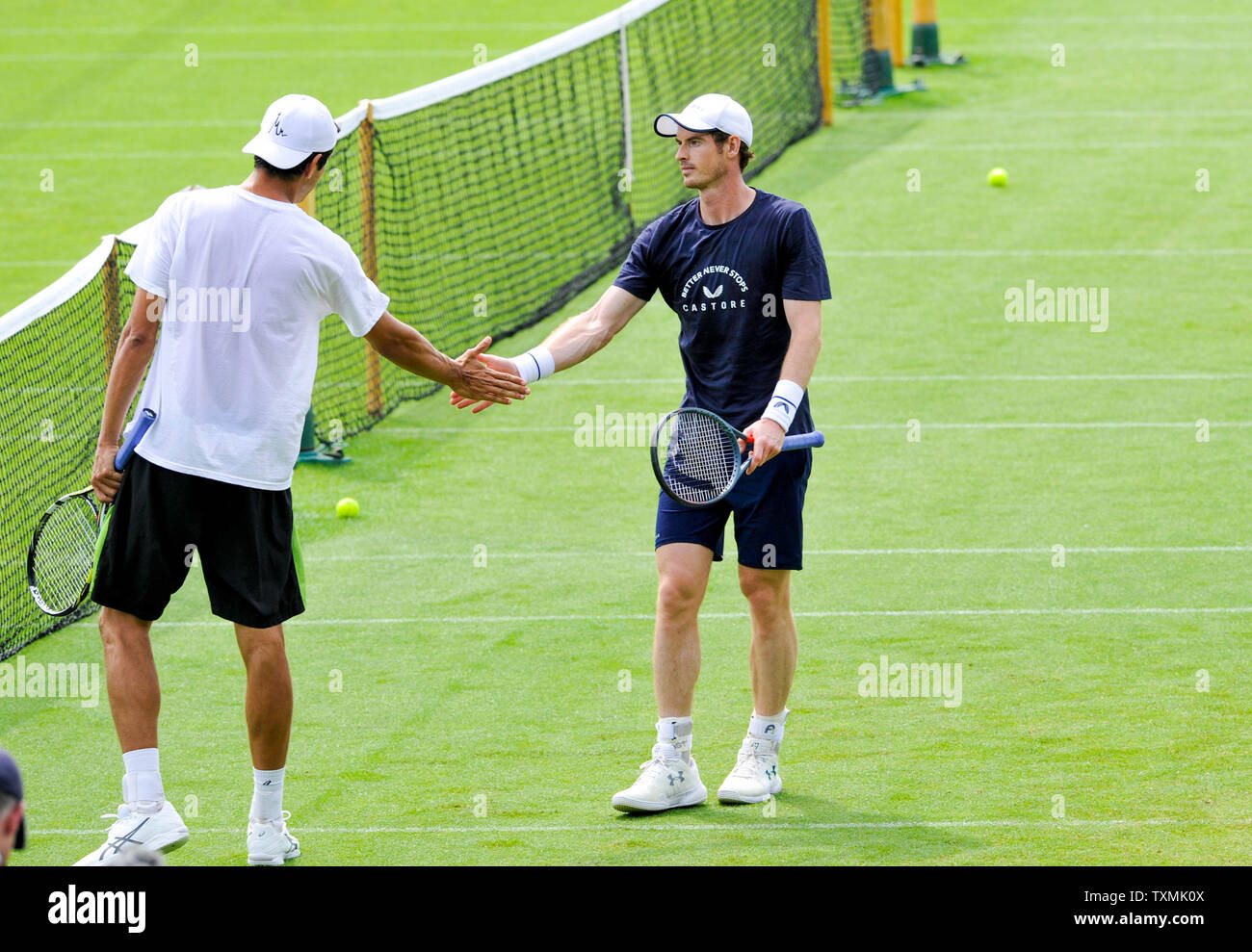 Eastbourne, UK. 25th June, 2019. Andy Murray during a training session before his doubles match later on at the Nature Valley International tennis tournament held at Devonshire Park in Eastbourne . Credit: Simon Dack/Alamy Live News Stock Photo