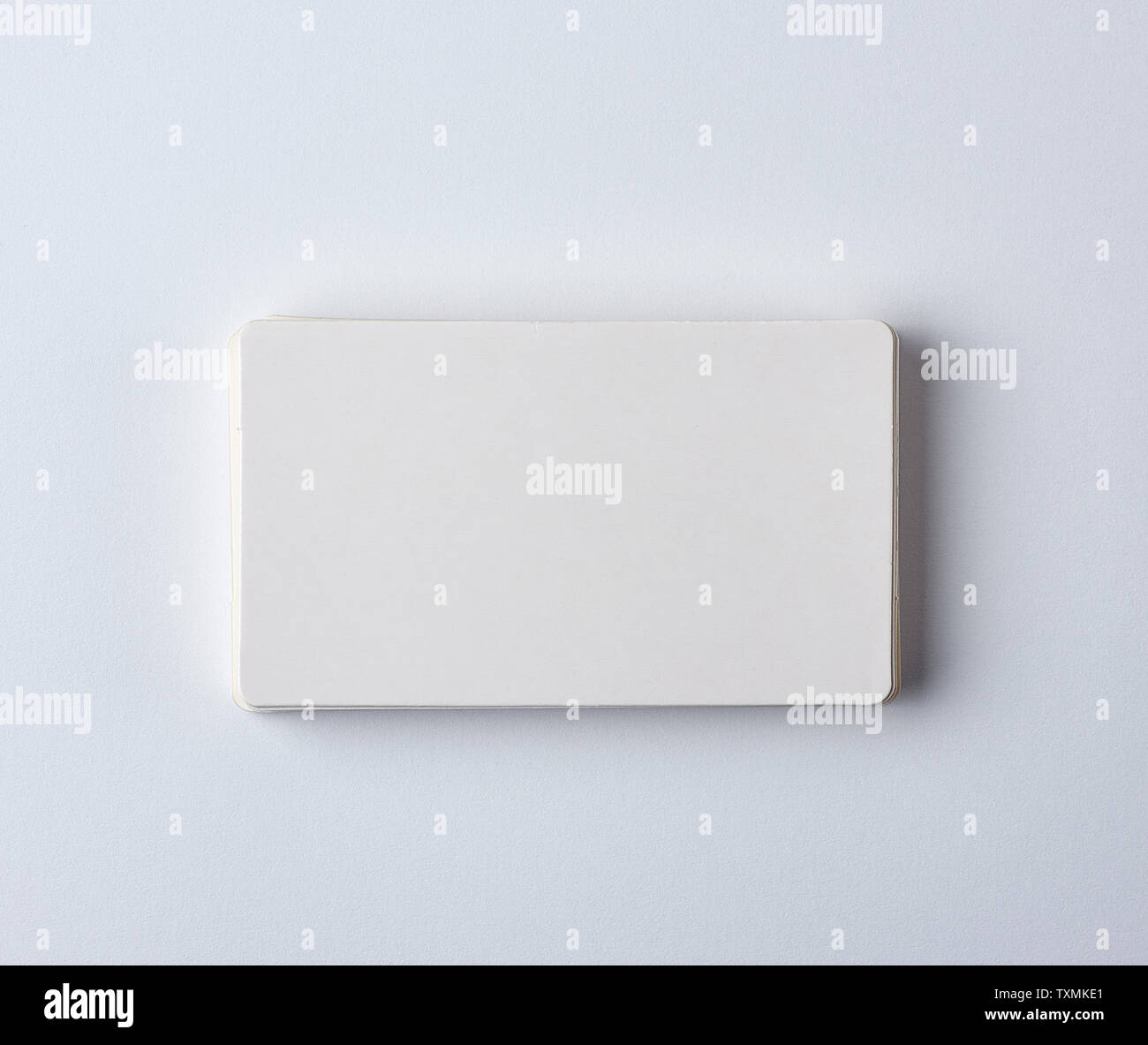 Rectangle Paper Top View stack of blank rectangular paper white business cards on a white ...