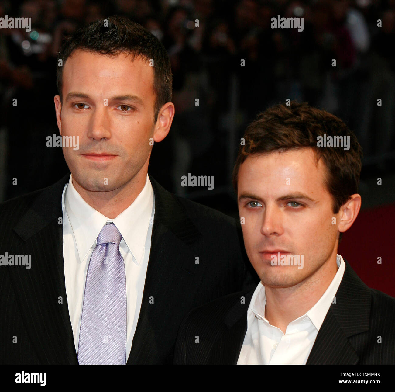 Actors Ben Affleck (L) and brother Casey arrive on the red carpet at the 33rd American Film Festival of Deauville in Deauville, France on September 5, 2007.  The brothers are at the festival with their film 'Gone, Baby, Gone', in which Ben Affleck makes his directorial debut.   (UPI Photo/David Silpa) Stock Photo