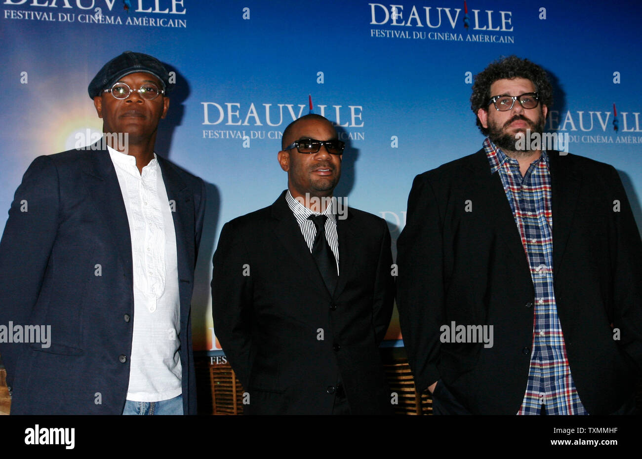 Actor Samuel Jackson (L), producer James Lassiter (C) and director Neil LaBute arrive at a photocall for the film 'Lakeview Terrace' during the 34th American Film Festival of Deauville in Deauville, France on September 7, 2008.    (UPI Photo/David Silpa) Stock Photo