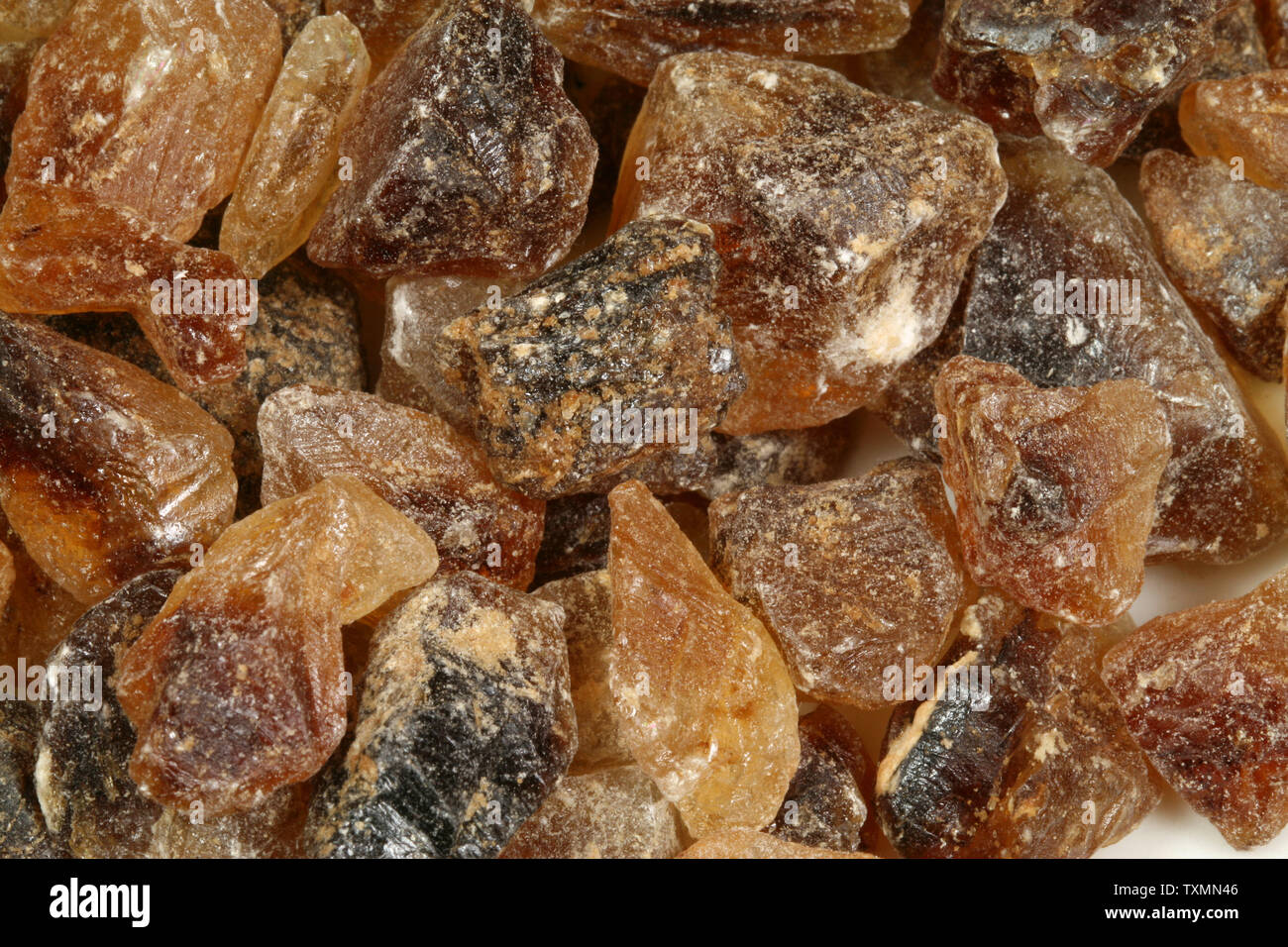 Candied and crystallized brown sugar closeup and background Stock Photo Alamy