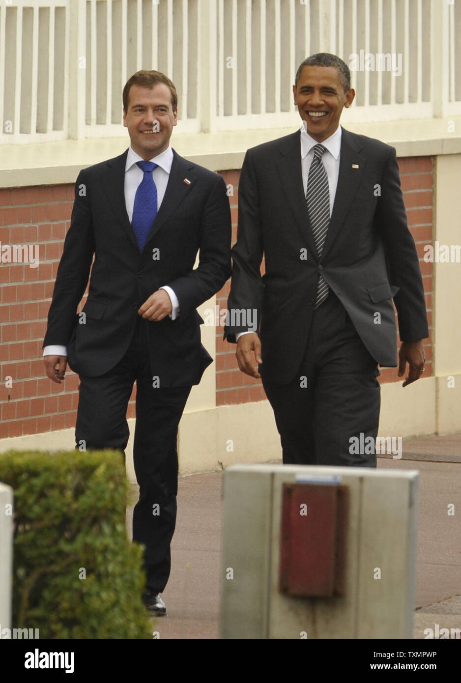 U.S. President Barack Obama (R) walks with Russian President Dmitry Medvedev as they arrive at the G8 Summit in Deauville, France, on May 26, 2011. UPI Stock Photo