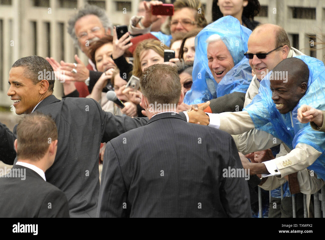 U.S. President Barack Obama greets people as he arrives at the G8 Summit in Deauville, France, May 26, 2011. UPI Stock Photo