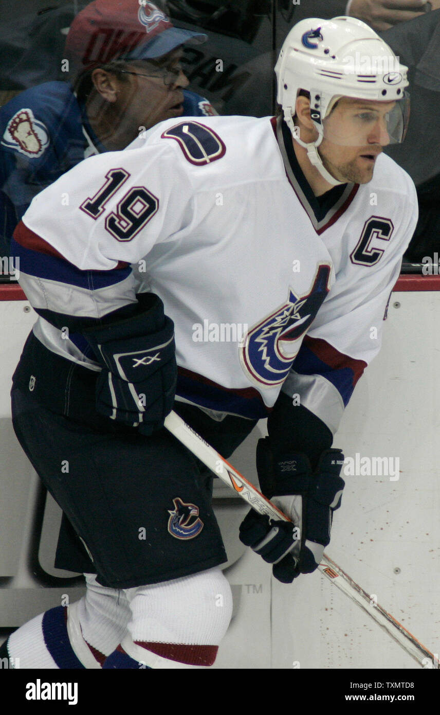Markus Naslund of the Vancouver Canucks looks on against the