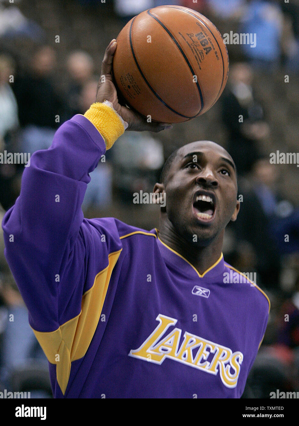 Los Angeles Lakers Kobe Bryant eyes the basket during warmups prior to opening the NBA season against the Denver Nuggets at the Pepsi Center in Denver November 2, 2005.  (UPI Photo/Gary C. Caskey) Stock Photo