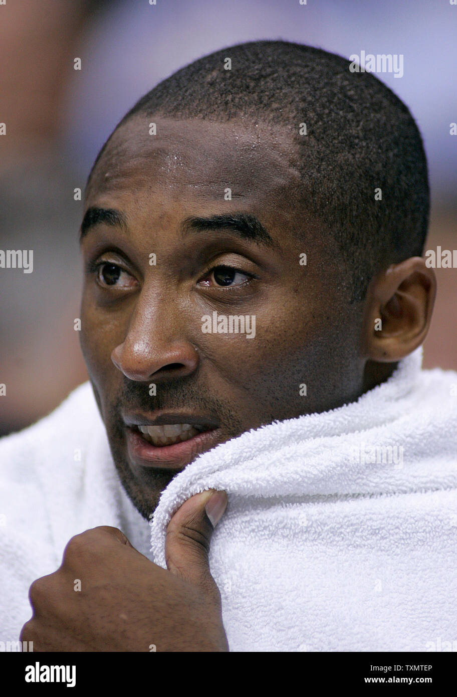 Los Angeles Lakers guard Kobe Bryant watches his team against the Denver Nuggets during a break in the first quarter at the Pepsi Center in Denver November 2, 2005.  (UPI Photo/Gary C. Caskey) Stock Photo