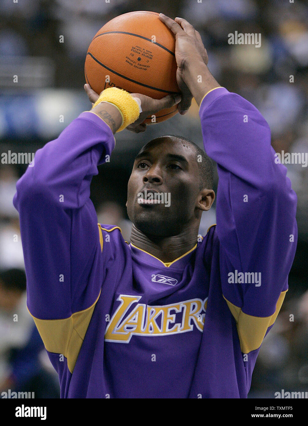 Los Angeles Lakers Kobe Bryant warms up prior to season opener against the Denver Nuggets at the Pepsi Center in Denver November 2, 2005.  (UPI Photo/Gary C. Caskey) Stock Photo