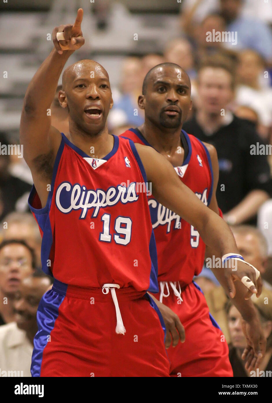Houston Rockets Sam Cassell celebrates after two of his 16 first